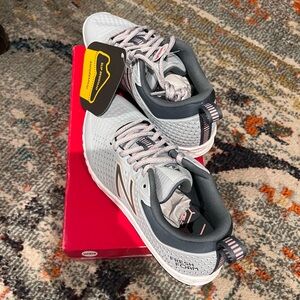 Brand New with Tags New Balance sneakers. Size 8 1/2. Gorgeous pale blue color.